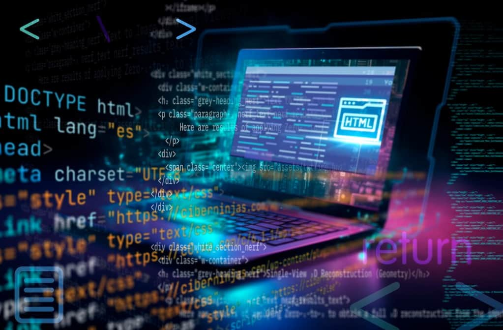 the colorful code and opened laptop on the blurred background in the semidarkness